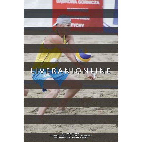 14.06.2014 , Myslowice , Slupna , siatkowka plazowa , Mistrzostwa Swiata U23 , Buivids , Reinis (czerwone) Kosiak , Rudol (zolte) N/Z Maciej Rudol Fot. Karol Bartnik / MPAimages.com / Newspix.pl --- Newspix.pl World Championships in beach volleyball U23 AG ALDO LIVERANI SAS ONLY ITALY *** Local Caption *** www.newspix.pl mail us: info@newspix.pl call us: 0048 022 23 22 222 --- Polish Picture Agency by Ringier Axel Springer Poland