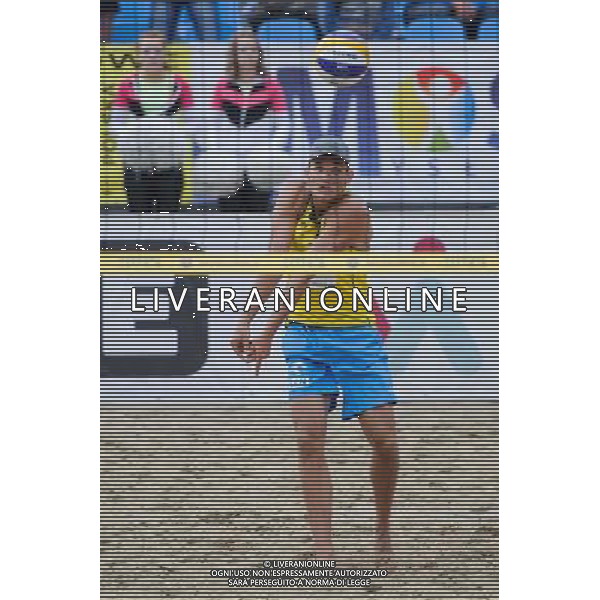 14.06.2014 , Myslowice , Slupna , siatkowka plazowa , Mistrzostwa Swiata U23 , Buivids , Reinis (czerwone) Kosiak , Rudol (zolte) N/Z Maciej Kosiak Fot. Karol Bartnik / MPAimages.com / Newspix.pl --- Newspix.pl World Championships in beach volleyball U23 AG ALDO LIVERANI SAS ONLY ITALY *** Local Caption *** www.newspix.pl mail us: info@newspix.pl call us: 0048 022 23 22 222 --- Polish Picture Agency by Ringier Axel Springer Poland