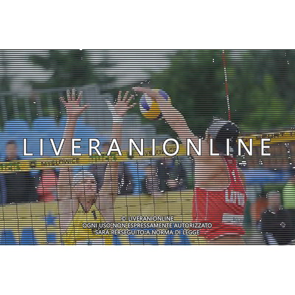 14.06.2014 , Myslowice , Slupna , siatkowka plazowa , Mistrzostwa Swiata U23 , Buivids , Reinis (czerwone) Kosiak , Rudol (zolte) N/Z Maciej Rudol , Pekmanis Reinis Fot. Karol Bartnik / MPAimages.com / Newspix.pl --- Newspix.pl World Championships in beach volleyball U23 AG ALDO LIVERANI SAS ONLY ITALY *** Local Caption *** www.newspix.pl mail us: info@newspix.pl call us: 0048 022 23 22 222 --- Polish Picture Agency by Ringier Axel Springer Poland
