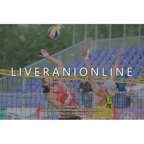 14.06.2014 , Myslowice , Slupna , siatkowka plazowa , Mistrzostwa Swiata U23 , Buivids , Reinis (czerwone) Kosiak , Rudol (zolte) N/Z Pekmanis Reinis , Maciej Rudol Fot. Karol Bartnik / MPAimages.com / Newspix.pl --- Newspix.pl World Championships in beach volleyball U23 AG ALDO LIVERANI SAS ONLY ITALY *** Local Caption *** www.newspix.pl mail us: info@newspix.pl call us: 0048 022 23 22 222 --- Polish Picture Agency by Ringier Axel Springer Poland