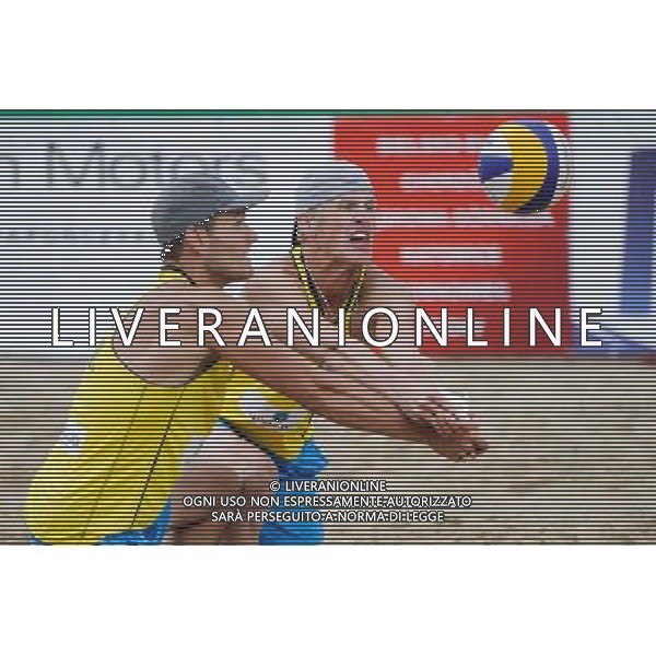 14.06.2014 , Myslowice , Slupna , siatkowka plazowa , Mistrzostwa Swiata U23 , Buivids , Reinis (czerwone) Kosiak , Rudol (zolte) N/Z Maciej Kosiak , Maciej Rudol Fot. Karol Bartnik / MPAimages.com / Newspix.pl --- Newspix.pl World Championships in beach volleyball U23 AG ALDO LIVERANI SAS ONLY ITALY *** Local Caption *** www.newspix.pl mail us: info@newspix.pl call us: 0048 022 23 22 222 --- Polish Picture Agency by Ringier Axel Springer Poland