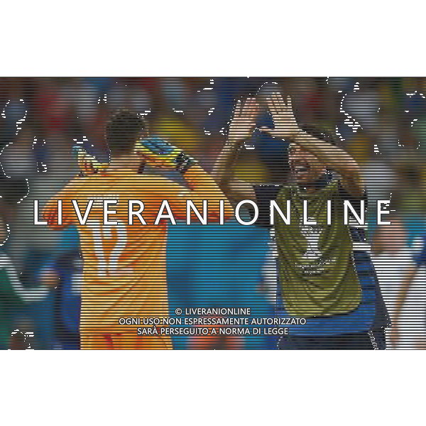 (140614) -- MANAUS, June 14, 2014 () -- Italy\'s goalkeeper Salvatore Sirigu (L) celebrates the victory with Gianluigi Buffon after a Group D match between England and Italy of 2014 FIFA World Cup in the Arena Amazonia Stadium in Manaus, Brazil, June 14, 2014. Italy won 2-1 over England on Saturday.(/Wang Lili)(rh) AG ALDOL IVERANI SAS ONLY ITALY