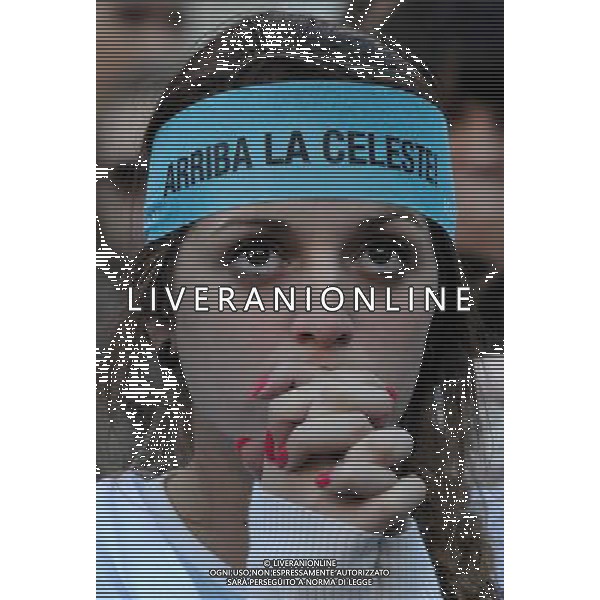 (140614) -- MONTEVIDEO, June 14, 2014 () -- An Uruguay\'s fan reacts while watching a Group D match between Uruguay and Costa Rica of 2014 FIFA World Cup on a screen in Montevideo, capital of Uruguay, on June 14, 2014. Costa Rica won 3-1 over Uruguay on Saturday.(/Nicolas Celaya)(pcy) AG ALDO LIVERANI SAS ONLY ITALY