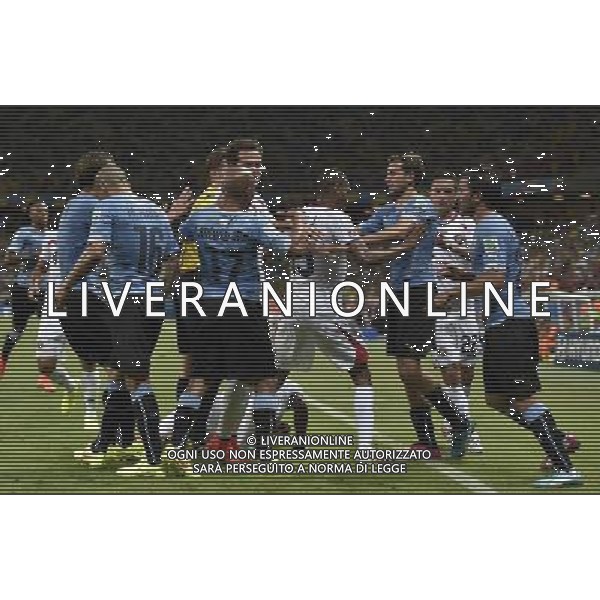 (140614) -- FORTALEZA, June 14, 2014 () -- Players react after Costa Rica\'s Joel Campbell (down) is kicked by Uruguay\'s No.16 Maximiliano Pereira during a Group D match between Uruguay and Costa Rica of 2014 FIFA World Cup at the Estadio Castelao Stadium in Fortaleza, Brazil, June 14, 2014. Costa Rica won 3-1 over Uruguay on Saturday.(/Lui Siu Wai)(pcy) AG ALDO LIVERANI SAS ONLY ITALY