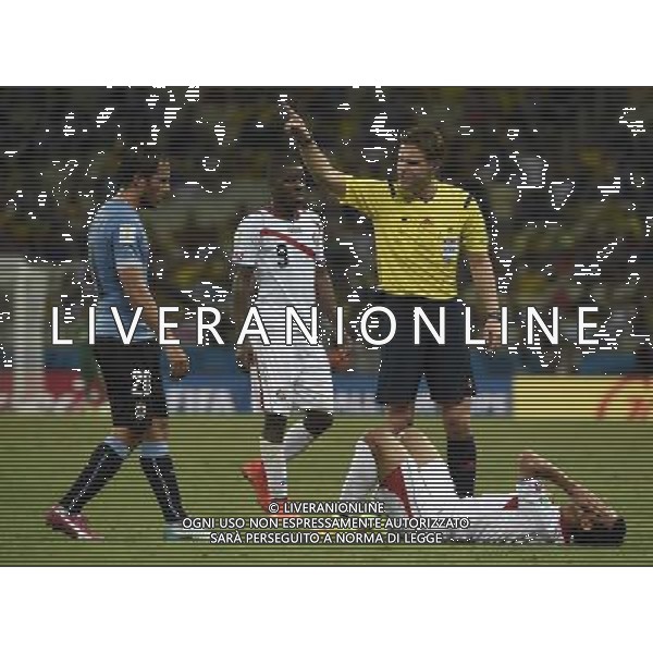 (140614) -- FORTALEZA, June 14, 2014 () -- Players react as German referee Felix Brych (2nd R) calls a foul during a Group D match between Uruguay and Costa Rica of 2014 FIFA World Cup at the Estadio Castelao Stadium in Fortaleza, Brazil, June 14, 2014. Costa Rica won 3-1 over Uruguay on Saturday.(/Lui Siu Wai)(pcy) AG ALDO LIVERANI SAS ONLY ITALY