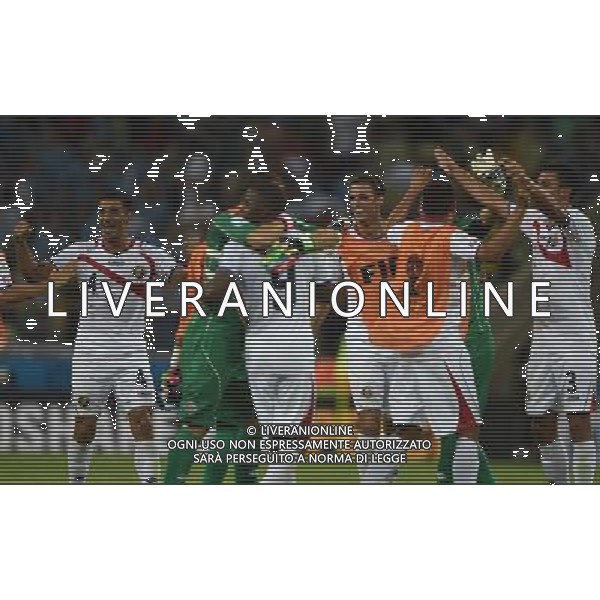 (140614) -- FORTALEZA, June 14, 2014 () -- Costa Rica\'s players celebrate their victory after a Group D match between Uruguay and Costa Rica of 2014 FIFA World Cup in the Estadio Castelao Stadium in Fortaleza, Brazil, June 14, 2014. Costa Rica won 3-1 over Uruguay on Saturday. (/Guo Yong)(rh) AG ALDO LIVERANI SAS ONLY ITALY