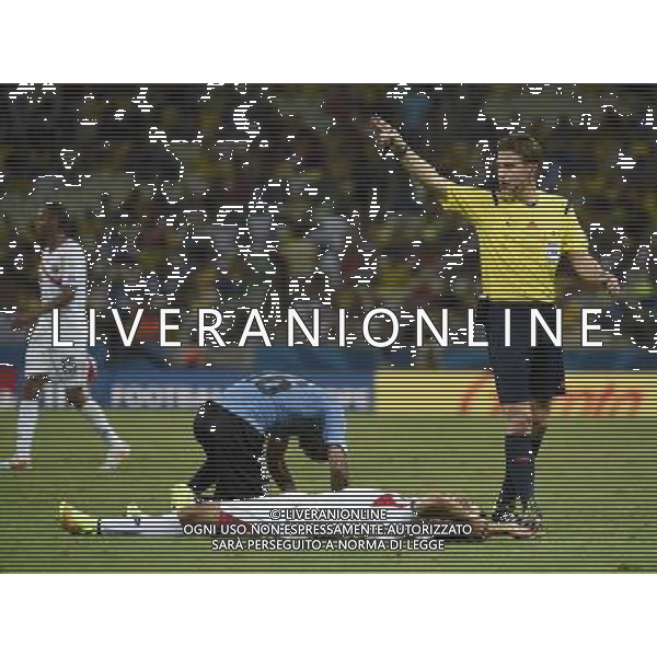 (140614) -- FORTALEZA, June 14, 2014 () -- German referee Felix Brych (R) calls a foul on Uruguay\'s Maximiliano Pereira (2nd L) during a Group D match between Uruguay and Costa Rica of 2014 FIFA World Cup at the Estadio Castelao Stadium in Fortaleza, Brazil, June 14, 2014. Costa Rica won 3-1 over Uruguay on Saturday.(/Lui Siu Wai)(pcy) AG ALDO LIVERANI SAS ONLY ITALY