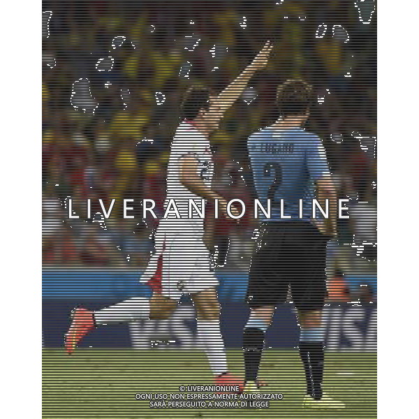 (140614) -- FORTALEZA, June 14, 2014 () -- Costa Rica\'s Marco Urena (L) celebrates his goal during a Group D match between Uruguay and Costa Rica of 2014 FIFA World Cup at the Estadio Castelao Stadium in Fortaleza, Brazil, June 14, 2014. Costa Rica won 3-1 over Uruguay on Saturday.(/Lui Siu Wai)(pcy) AG ALDO LIVERANI SAS ONLY ITALY