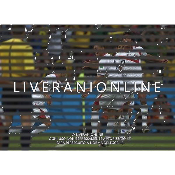 (140614) -- FORTALEZA, June 14, 2014 () -- Costa Rica\'s Oscar Duarte (C) celebrates his goal during a Group D match between Uruguay and Costa Rica of 2014 FIFA World Cup in the Estadio Castelao Stadium in Fortaleza, Brazil, June 14, 2014. (/Guo Yong)(rh) AG ALDO LIVERANI SAS ONLY ITALY