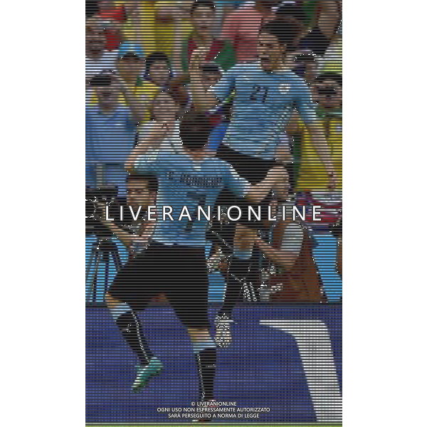 (140614) -- FORTALEZA, June 14, 2014 () -- Uruguay\'s Edinson Cavani (up) celebrates for a penalty goal during a Group D match between Uruguay and Costa Rica of 2014 FIFA World Cup in the Estadio Castelao Stadium in Fortaleza, Brazil, June 14, 2014. (/Guo Yong)(rh) AG ALDO LIVERANI SAS ONLY ITALY