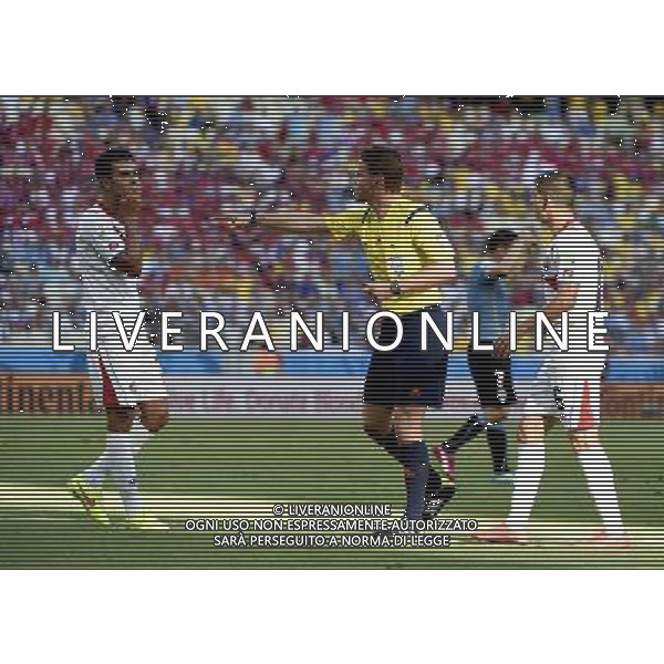 (140614) -- FORTALEZA, June 14, 2014 () -- German referee Felix Brych (C) gives a penalty kick to Uruguay during a Group D match between Uruguay and Costa Rica of 2014 FIFA World Cup at the Estadio Castelao Stadium in Fortaleza, Brazil, June 14, 2014. (/Lui Siu Wai)(pcy) AG ALDO LIVERANI SAS ONLY ITALY