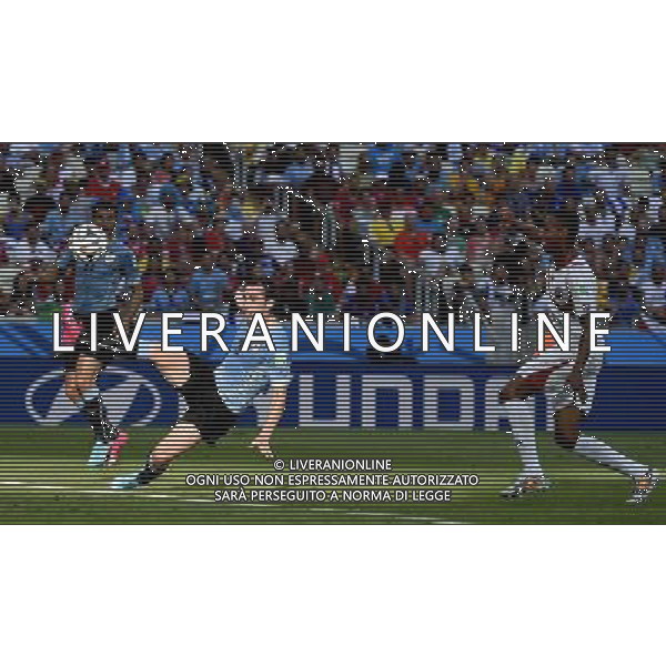 (140614) -- FORTALEZA, June 14, 2014 () -- Uruguay\'s Diego Godin (L) shoots the ball during a Group D match between Uruguay and Costa Rica of 2014 FIFA World Cup at the Estadio Castelao Stadium in Fortaleza, Brazil, June 14, 2014. (/Lui Siu Wai)(pcy) AG ALDO LIVERANI SAS ONLY ITALY