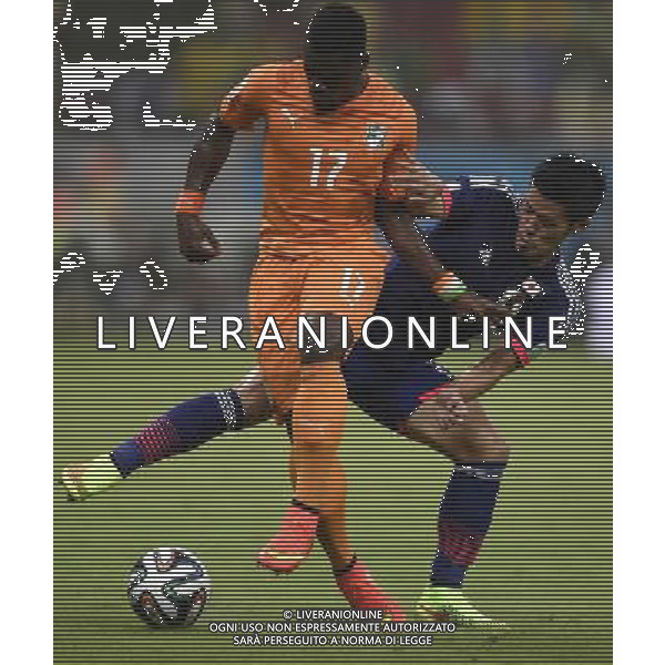 (140614) -- RECIFE, June 14, 2014 () -- Cote d\'Ivoire\'s Serge Aurier controls the ball during a Group C match between Cote d\'Ivoire and Japan of 2014 FIFA World Cup in the Aren Pernambuco Stadium in Recife, Brazil, June 14, 2014. (/Cao Can)(rh) ©PHOTOSHOT/Agenzia Aldo Liverani sas - ITALY ONLY - EDITORIAL USE ONLY - Costa d\'Avorio Vs Giappone partita del Gruppo C della coppa del mondo 2014 FIFA World Cup Stadium Arena Pernambuco a Recife, in Brasile, 14 giugno 2014
