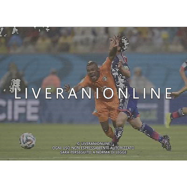 (140614) -- RECIFE, June 14, 2014 () -- Cote d\'Ivoire\'s Geoffroy Serey Die (L) vies with Japan\'s Maya Yoshida during a Group C match between Cote d\'Ivoire and Japan of 2014 FIFA World Cup at the Arena Pernambuco Stadium in Recife, Brazil, June 14, 2014. (/Yang Lei)(pcy) ©PHOTOSHOT/Agenzia Aldo Liverani sas - ITALY ONLY - EDITORIAL USE ONLY - Costa d\'Avorio Vs Giappone partita del Gruppo C della coppa del mondo 2014 FIFA World Cup Stadium Arena Pernambuco a Recife, in Brasile, 14 giugno 2014