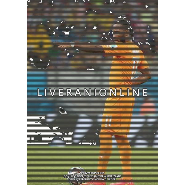 (140614) -- RECIFE, June 14, 2014 () -- Cote d\'Ivoire\'s Didier Drogba instructs teammates to form a wall before he kicks a freeball during a Group C match between Cote d\'Ivoire and Japan of 2014 FIFA World Cup in the Aren Pernambuco Stadium in Recife, Brazil, June 14, 2014. (/Cao Can)(rh) ©PHOTOSHOT/Agenzia Aldo Liverani sas - ITALY ONLY - EDITORIAL USE ONLY - Costa d\'Avorio Vs Giappone partita del Gruppo C della coppa del mondo 2014 FIFA World Cup Stadium Arena Pernambuco a Recife, in Brasile, 14 giugno 2014
