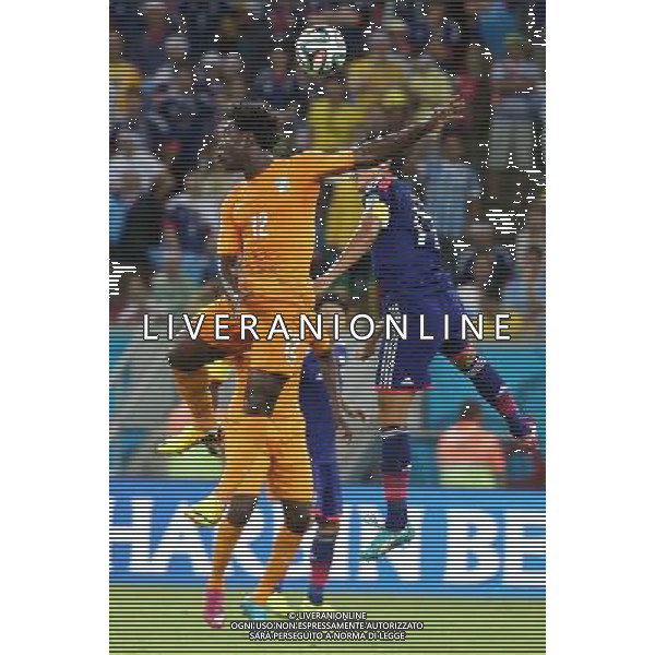 (140614) -- RECIFE, June 14, 2014 () -- Cote d\'Ivoire\'s Wilfried Bony competes a headball during a Group C match between Cote d\'Ivoire and Japan of 2014 FIFA World Cup in the Aren Pernambuco Stadium in Recife, Brazil, June 14, 2014. (/Cao Can)(rh) ©PHOTOSHOT/Agenzia Aldo Liverani sas - ITALY ONLY - EDITORIAL USE ONLY - Costa d\'Avorio Vs Giappone partita del Gruppo C della coppa del mondo 2014 FIFA World Cup Stadium Arena Pernambuco a Recife, in Brasile, 14 giugno 2014