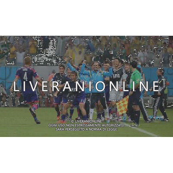 (140614) -- RECIFE, June 14, 2014 () -- Japan\'s Keisuke Honda (1st L) celebrates the goal during a Group C match between Cote d\'Ivoire and Japan of 2014 FIFA World Cup in the Aren Pernambuco Stadium in Recife, Brazil, June 14, 2014. (/Cao Can)(rh) ©PHOTOSHOT/Agenzia Aldo Liverani sas - ITALY ONLY - EDITORIAL USE ONLY - Costa d\'Avorio Vs Giappone partita del Gruppo C della coppa del mondo 2014 FIFA World Cup Stadium Arena Pernambuco a Recife, in Brasile, 14 giugno 2014