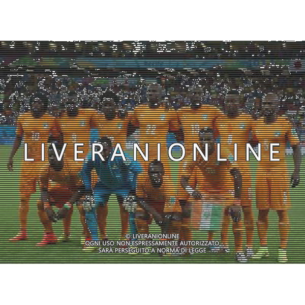 (140614) -- RECIFE, June 14, 2014 () -- Cote d\'Ivoire\'s national team players pose for a group photo during a Group C match between Cote d\'Ivoire and Japan of 2014 FIFA World Cup in the Aren Pernambuco Stadium in Recife, Brazil, June 14, 2014. (/Cao Can)(rh) ©PHOTOSHOT/Agenzia Aldo Liverani sas - ITALY ONLY - EDITORIAL USE ONLY - Costa d\'Avorio Vs Giappone partita del Gruppo C della coppa del mondo 2014 FIFA World Cup Stadium Arena Pernambuco a Recife, in Brasile, 14 giugno 2014 - FORMAZIONE COSTA D\'AVORIO
