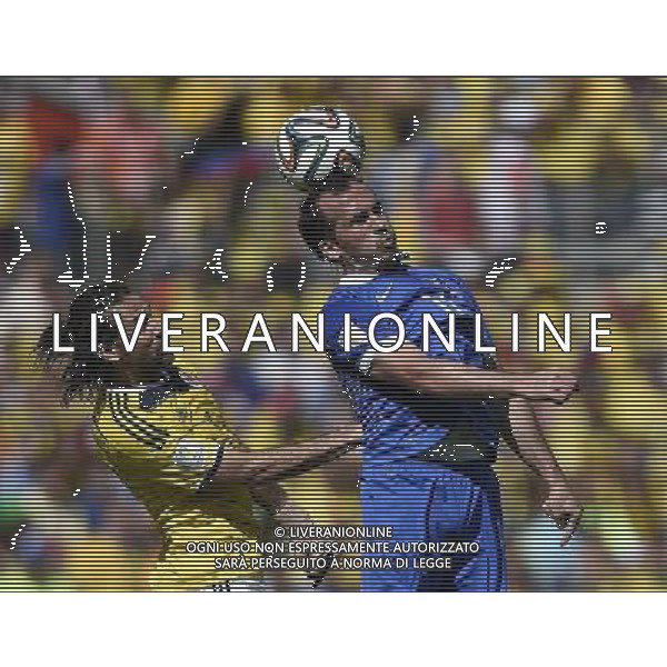 (140614) -- BELO HORIZONTE, June 14, 2014 () -- Greece\'s Theofanis Gekas (R) heads a ball during a Group C match between Colombia and Greece of 2014 FIFA World Cup at the Estadio Mineirao Stadium in Belo Horizonte, Brazil, June 14, 2014. Colombia won 3-0 over Greece on Saturday. (/Qi Heng)(pcy) ©PHOTOSHOT/Agenzia Aldo Liverani sas - ITALY ONLY - EDITORIAL USE ONLY - Colombia Vs Grecia partita del Gruppo C Coppa del Mondo FIFA 2014 Mineirao stadio Estadio a Belo Horizonte, in Brasile 14 Giugno 2014