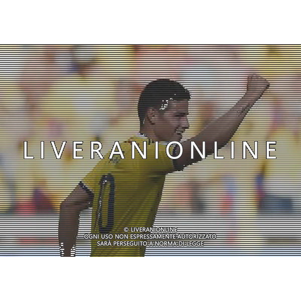 (140614) -- BELO HORIZONTE, June 14, 2014 () -- Colombia\'s James Rodriguez celebrates his goal, Colombia\'s third goal, during a Group C match between Colombia and Greece of 2014 FIFA World Cup at the Estadio Mineirao Stadium in Belo Horizonte, Brazil, June 14, 2014. Colombia won 3-0 over Greece on Saturday. (/Qi Heng)(pcy) ©PHOTOSHOT/Agenzia Aldo Liverani sas - ITALY ONLY - EDITORIAL USE ONLY - Colombia Vs Grecia partita del Gruppo C Coppa del Mondo FIFA 2014 Mineirao stadio Estadio a Belo Horizonte, in Brasile 14 Giugno 2014