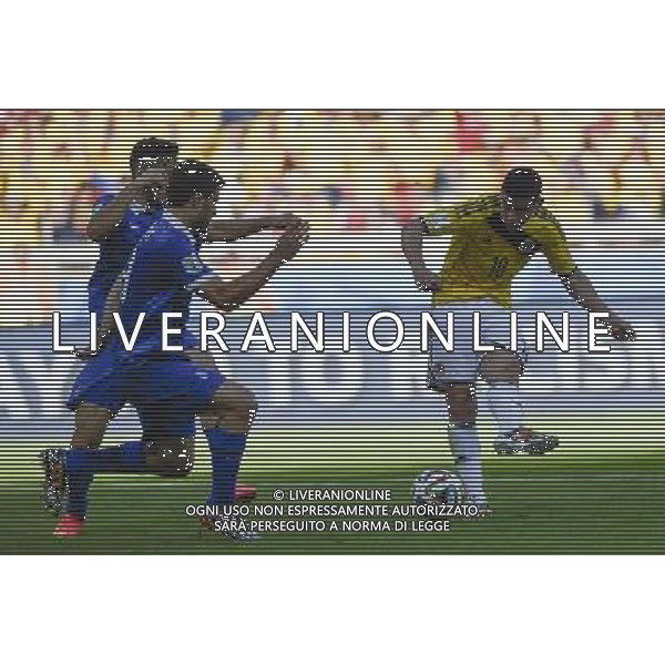 (140614) -- BELO HORIZONTE, June 14, 2014 () -- Colombia\'s James Rodriguez shoots the ball during a Group C match between Colombia and Greece of 2014 FIFA World Cup at the Estadio Mineirao Stadium in Belo Horizonte, Brazil, June 14, 2014. Colombia won 3-0 over Greece on Saturday. (/Qi Heng)(pcy) ©PHOTOSHOT/Agenzia Aldo Liverani sas - ITALY ONLY - EDITORIAL USE ONLY - Colombia Vs Grecia partita del Gruppo C Coppa del Mondo FIFA 2014 Mineirao stadio Estadio a Belo Horizonte, in Brasile 14 Giugno 2014