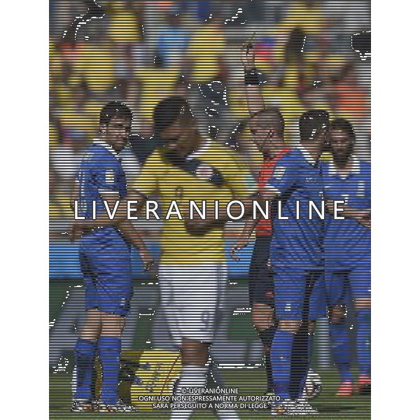 (140614) -- BELO HORIZONTE, June 14, 2014 () -- Referee Mark W. Geiger from U.S. gives a yellow card to Greece\'s Sokratis Papastathopoulos (1st L) as he fouls on Colombia\'s Victor Ibarbo (down) during a Group C match between Colombia and Greece of 2014 FIFA World Cup at the Estadio Mineirao Stadium in Belo Horizonte, Brazil, June 14, 2014. Colombia won 3-0 over Greece on Saturday. (/Qi Heng)(pcy) ©PHOTOSHOT/Agenzia Aldo Liverani sas - ITALY ONLY - EDITORIAL USE ONLY - Colombia Vs Grecia partita del Gruppo C Coppa del Mondo FIFA 2014 Mineirao stadio Estadio a Belo Horizonte, in Brasile 14 Giugno 2014