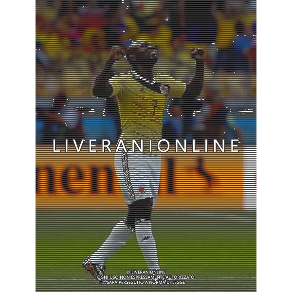 (140614) -- BELO HORIZONTE, June 14, 2014 () -- Colombia\'s Pablo Armero celebrates his teammate Teofilo Gutierrez\'s goal, Colombia\'s second goal, during a Group C match between Colombia and Greece of 2014 FIFA World Cup at the Estadio Mineirao Stadium in Belo Horizonte, Brazil, June 14, 2014. (/Liu Bin)(pcy) ©PHOTOSHOT/Agenzia Aldo Liverani sas - ITALY ONLY - EDITORIAL USE ONLY - Colombia Vs Grecia partita del Gruppo C Coppa del Mondo FIFA 2014 Mineirao stadio Estadio a Belo Horizonte, in Brasile 14 Giugno 2014