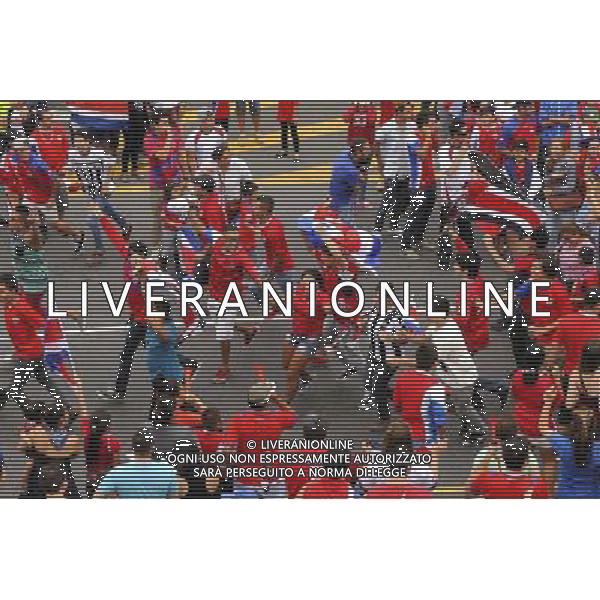 (140614) -- SAN JOSE, June 14, 2014 () -- Costa Rica?s fans celebrate after watching a Group D match between Uruguay and Costa Rica of 2014 FIFA World Cup on a screen in San Jose, capital of Costa Rica, on June 14, 2014. Costa Rica won 3-1 over Uruguay on Saturday.(/Jeffrey Zamora/La Nacion)(pcy) COSTA RICA OUT ***EDITORIAL USE ONLY*** ***NO ARCHIVE- NO SALES*** ©PHOTOSHOT/Agenzia Aldo Liverani sas - ITALY ONLY - EDITORIAL USE ONLY - Uruguay vs Costa Rica partita del Gruppo D della Coppa del mondo FIFA 2014 Castelao stadio Estadio a Fortaleza, in Brasile, 14 Giugno 2014