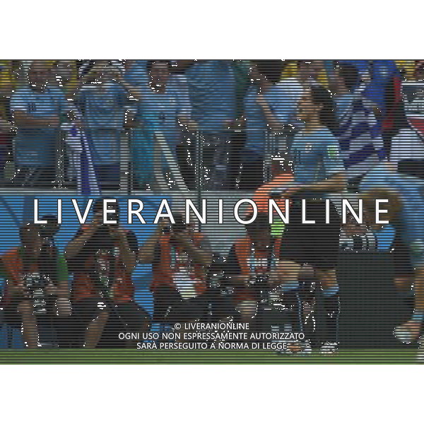 (140614) -- FORTALEZA, June 14, 2014 () -- Uruguay\'s Edinson Cavani celebrates for a penalty goal during a Group D match between Uruguay and Costa Rica of 2014 FIFA World Cup in the Estadio Castelao Stadium in Fortaleza, Brazil, June 14, 2014. (/Guo Yong)(rh) ©PHOTOSHOT/Agenzia Aldo Liverani sas - ITALY ONLY - EDITORIAL USE ONLY - Uruguay vs Costa Rica partita del Gruppo D della Coppa del mondo FIFA 2014 Castelao stadio Estadio a Fortaleza, in Brasile, 14 Giugno 2014