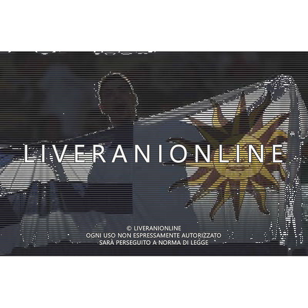 (140614) -- FORTALEZA, June 14, 2014 () -- An Uruguay\'s fan is seen sihlouetted before a Group D match between Uruguay and Costa Rica of 2014 FIFA World Cup in the Estadio Castelao Stadium in Fortaleza, Brazil, June 14, 2014. (/Lui Siu Wai)(rh) ©PHOTOSHOT/Agenzia Aldo Liverani sas - ITALY ONLY - EDITORIAL USE ONLY - Uruguay vs Costa Rica partita del Gruppo D della Coppa del mondo FIFA 2014 Castelao stadio Estadio a Fortaleza, in Brasile, 14 Giugno 2014