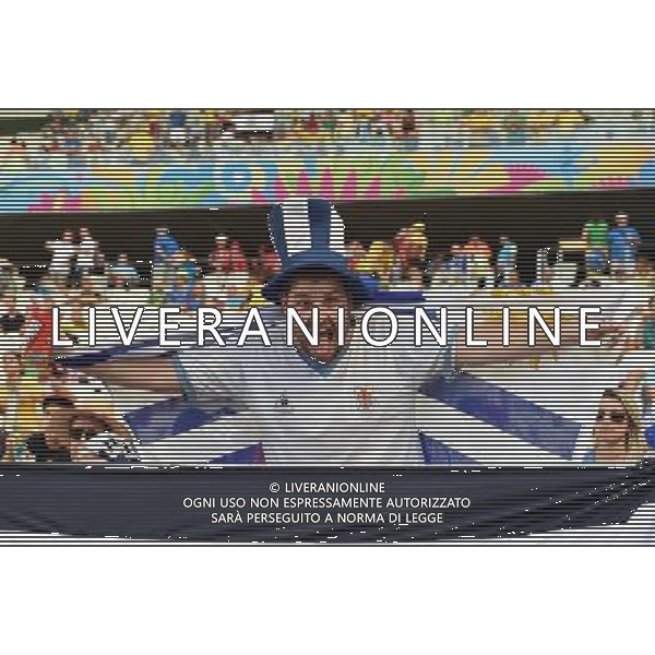 (140614) -- FORTALEZA, June 14, 2014 () -- An Uruguay\'s fan poses for photo before a Group D match between Uruguay and Costa Rica of 2014 FIFA World Cup in the Estadio Castelao Stadium in Fortaleza, Brazil, June 14, 2014. (/Guo Yong)(rh) ©PHOTOSHOT/Agenzia Aldo Liverani sas - ITALY ONLY - EDITORIAL USE ONLY - Uruguay vs Costa Rica partita del Gruppo D della Coppa del mondo FIFA 2014 Castelao stadio Estadio a Fortaleza, in Brasile, 14 Giugno 2014