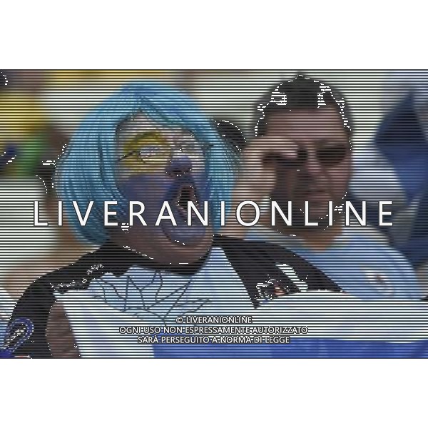 (140614) -- FORTALEZA, June 14, 2014 () ®C A Uruguay\'s fan cheers before a Group D match between Uruguay and Costa Rica of 2014 FIFA World Cup at the Estadio Castelao Stadium in Fortaleza, Brazil, June 14, 2014. (/Lui Siu Wai)(pcy) ©PHOTOSHOT/Agenzia Aldo Liverani sas - ITALY ONLY - EDITORIAL USE ONLY - Uruguay vs Costa Rica partita del Gruppo D della Coppa del mondo FIFA 2014 Castelao stadio Estadio a Fortaleza, in Brasile, 14 Giugno 2014