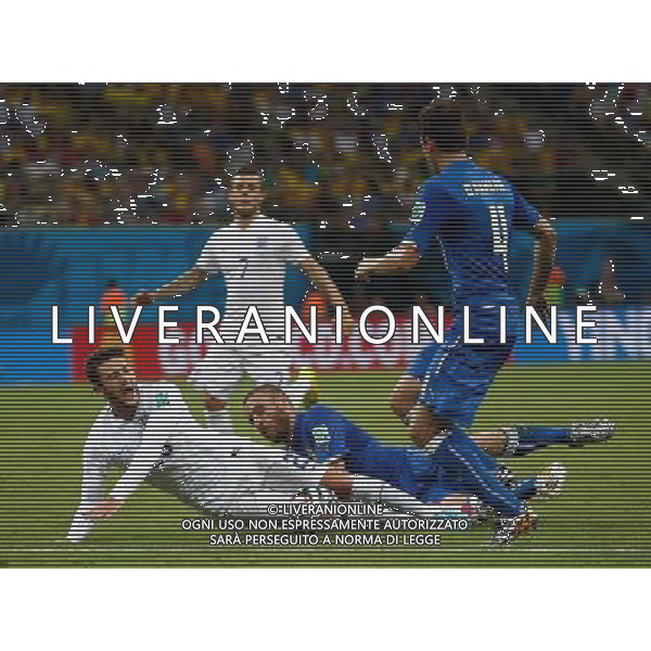 (140614) -- MANAUS, June 14, 2014 () -- England\'s Adam Lallana falls down during a Group D match between England and Italy of 2014 FIFA World Cup in the Arena Amazonia Stadium in Manaus, Brazil, June 14, 2014. Italy won 2-1 over England on Saturday.(/Wang Lili)(rh) ©PHOTOSHOT/Agenzia Aldo Liverani sas - ITALY ONLY - EDITORIAL USE ONLY - Italia - Inghilterra partita del Gruppo D coppa del mondo 2014 FIFA World Cup Stadio all\'Arena Amazzonia a Manaus, Brasile, 14 giugno 2014