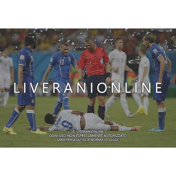 (140614) -- MANAUS, June 14, 2014 () -- England\'s Daniel Sturridge falls down on the field during a Group D match between England and Italy of 2014 FIFA World Cup in the Arena Amazonia Stadium in Manaus, Brazil, June 14, 2014. (/Zhou Lei)(rh) ©PHOTOSHOT/Agenzia Aldo Liverani sas - ITALY ONLY - EDITORIAL USE ONLY - Italia - Inghilterra partita del Gruppo D coppa del mondo 2014 FIFA World Cup Stadio all\'Arena Amazzonia a Manaus, Brasile, 14 giugno 2014