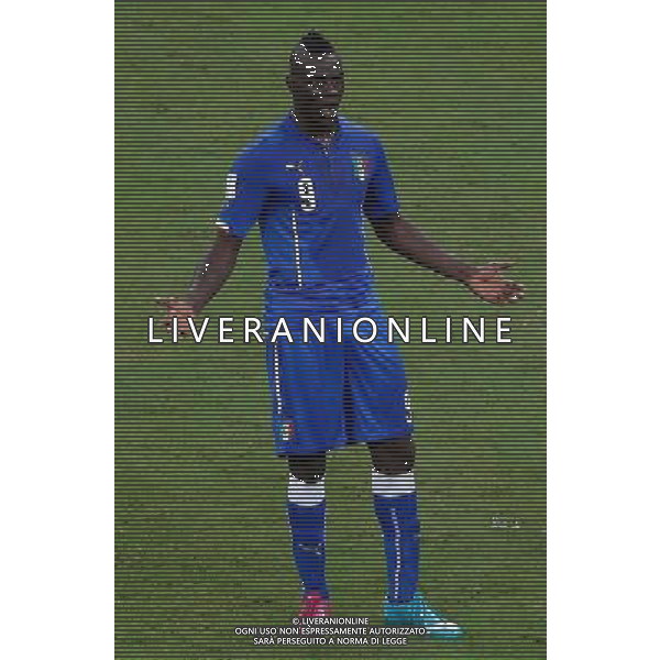 (140614) -- MANAUS, June 14, 2014 () -- Italy\'s Mario Balotelli reacts during a Group D match between England and Italy of 2014 FIFA World Cup at the Arena Amazonia Stadium in Manaus, Brazil, June 14, 2014. Italy won 2-1 over England on Saturday. (/Liao Yujie)(pcy) ©PHOTOSHOT/Agenzia Aldo Liverani sas - ITALY ONLY - EDITORIAL USE ONLY - Italia - Inghilterra partita del Gruppo D coppa del mondo 2014 FIFA World Cup Stadio all\'Arena Amazzonia a Manaus, Brasile, 14 giugno 2014