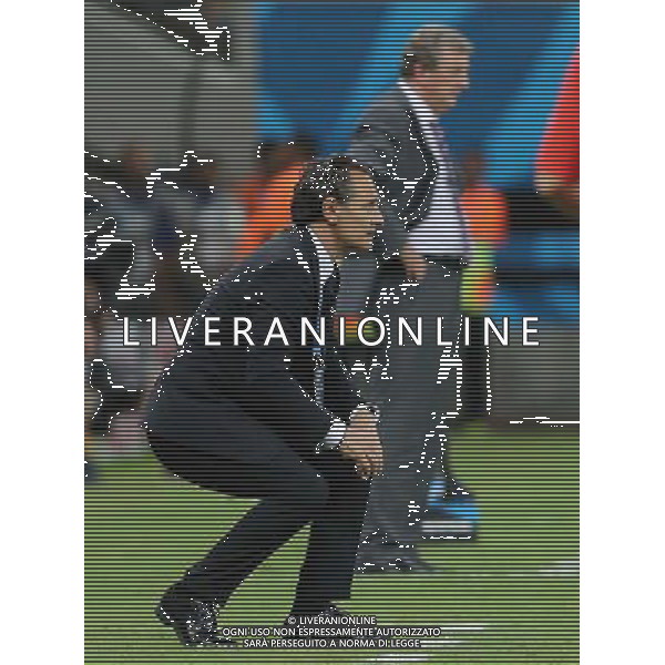 (140614) -- MANAUS, June 14, 2014 () -- Italy\'s coach Cesare Prandelli (front) watches the game during a Group D match between England and Italy of 2014 FIFA World Cup at the Arena Amazonia Stadium in Manaus, Brazil, June 14, 2014. Italy won 2-1 over England on Saturday. (/Xu Zijian)(pcy) ©PHOTOSHOT/Agenzia Aldo Liverani sas - ITALY ONLY - EDITORIAL USE ONLY - Italia - Inghilterra partita del Gruppo D coppa del mondo 2014 FIFA World Cup Stadio all\'Arena Amazzonia a Manaus, Brasile, 14 giugno 2014