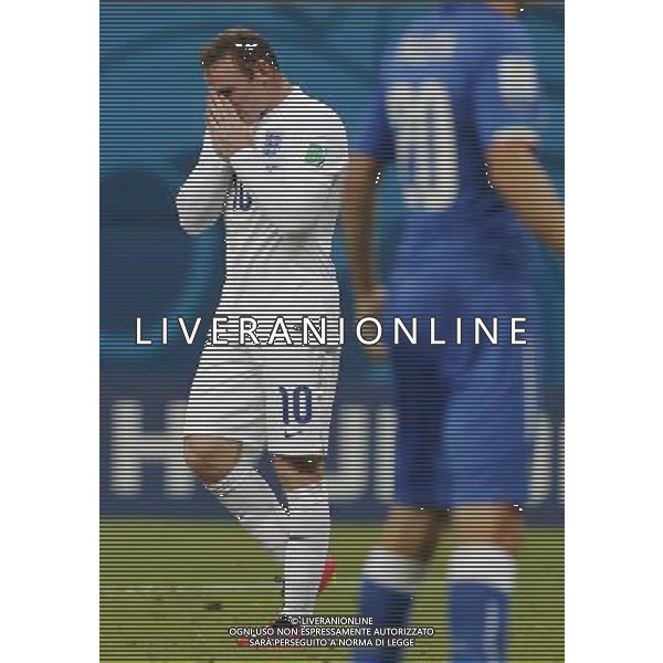 (140614) -- MANAUS, June 14, 2014 () -- England\'s Wayne Rooney reacts during a Group D match between England and Italy of 2014 FIFA World Cup in the Arena Amazonia Stadium in Manaus, Brazil, June 14, 2014. (/Zhou Lei)(rh) ©PHOTOSHOT/Agenzia Aldo Liverani sas - ITALY ONLY - EDITORIAL USE ONLY - Italia - Inghilterra partita del Gruppo D coppa del mondo 2014 FIFA World Cup Stadio all\'Arena Amazzonia a Manaus, Brasile, 14 giugno 2014