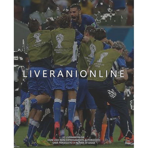 (140614) -- MANAUS, June 14, 2014 () -- Italy\'s players celebrate for Claudio Marchisio\'s goal during a Group D match between England and Italy of 2014 FIFA World Cup at the Arena Amazonia Stadium in Manaus, Brazil, June 14, 2014. (/Xu Zijian)(pcy) ©PHOTOSHOT/Agenzia Aldo Liverani sas - ITALY ONLY - EDITORIAL USE ONLY - Italia - Inghilterra partita del Gruppo D coppa del mondo 2014 FIFA World Cup Stadio all\'Arena Amazzonia a Manaus, Brasile, 14 giugno 2014