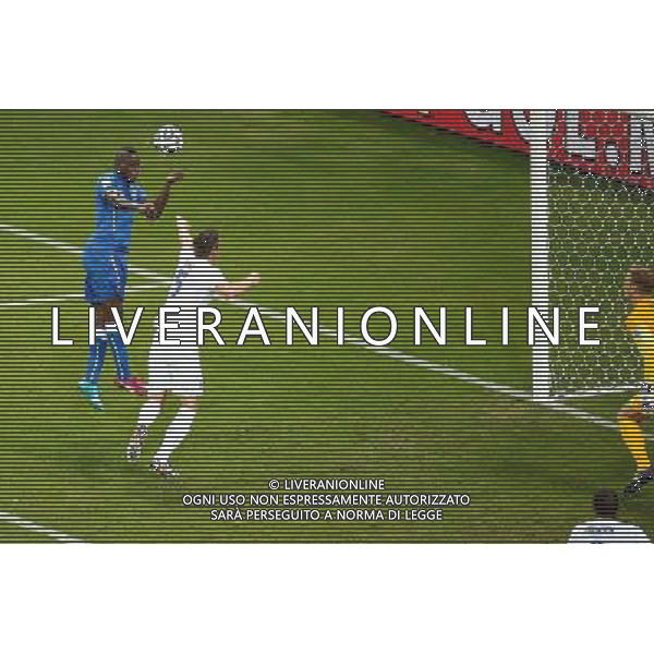 (140614) -- MANAUS, June 14, 2014 () -- Italy\'s Mario Balotelli (1st L) goals a headball during a Group D match between England and Italy of 2014 FIFA World Cup at the Arena Amazonia Stadium in Manaus, Brazil, June 14, 2014. (/Liao Yujie)(pcy) ©PHOTOSHOT/Agenzia Aldo Liverani sas - ITALY ONLY - EDITORIAL USE ONLY - Italia - Inghilterra partita del Gruppo D coppa del mondo 2014 FIFA World Cup Stadio all\'Arena Amazzonia a Manaus, Brasile, 14 giugno 2014