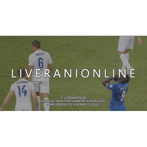 (140614) -- MANAUS, June 14, 2014 () -- Italy\'s Mario Balotelli (R) reacts during a Group D match between England and Italy of 2014 FIFA World Cup at the Arena Amazonia Stadium in Manaus, Brazil, June 14, 2014. (/Liao Yujie)(pcy) ©PHOTOSHOT/Agenzia Aldo Liverani sas - ITALY ONLY - EDITORIAL USE ONLY - Italia - Inghilterra partita del Gruppo D coppa del mondo 2014 FIFA World Cup Stadio all\'Arena Amazzonia a Manaus, Brasile, 14 giugno 2014