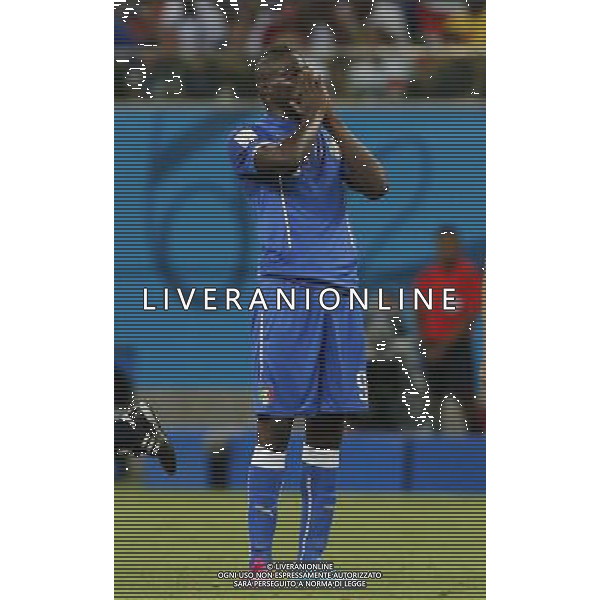 (140614) -- MANAUS, June 14, 2014 () -- Italy\'s Mario Balotelli reacts during a Group D match between England and Italy of 2014 FIFA World Cup in the Arena Amazonia Stadium in Manaus, Brazil, June 14, 2014. (/Zhou Lei)(rh) ©PHOTOSHOT/Agenzia Aldo Liverani sas - ITALY ONLY - EDITORIAL USE ONLY - Italia - Inghilterra partita del Gruppo D coppa del mondo 2014 FIFA World Cup Stadio all\'Arena Amazzonia a Manaus, Brasile, 14 giugno 2014