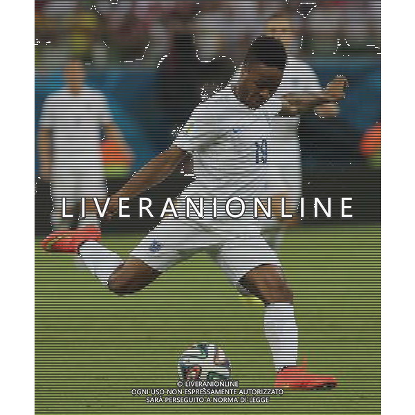(140614) -- MANAUS, June 14, 2014 () -- England\'s Raheem Sterling shoots the ball during a Group D match between England and Italy of 2014 FIFA World Cup at the Arena Amazonia Stadium in Manaus, Brazil, June 14, 2014. (/Xu Zijian)(pcy) ©PHOTOSHOT/Agenzia Aldo Liverani sas - ITALY ONLY - EDITORIAL USE ONLY - Italia - Inghilterra partita del Gruppo D coppa del mondo 2014 FIFA World Cup Stadio all\'Arena Amazzonia a Manaus, Brasile, 14 giugno 2014