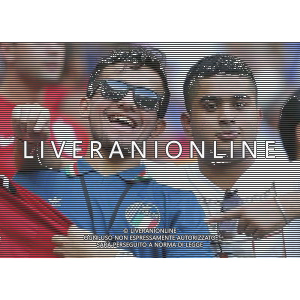 (140614) -- MANAUS, June 14, 2014 () -- Italy\'s fans pose before a Group D match between England and Italy of 2014 FIFA World Cup at the Arena Amazonia Stadium in Manaus, Brazil, June 14, 2014. (/Zhou Lei)(rh) ©PHOTOSHOT/Agenzia Aldo Liverani sas - ITALY ONLY - EDITORIAL USE ONLY - Italia - Inghilterra partita del Gruppo D coppa del mondo 2014 FIFA World Cup Stadio all\'Arena Amazzonia a Manaus, Brasile, 14 giugno 2014