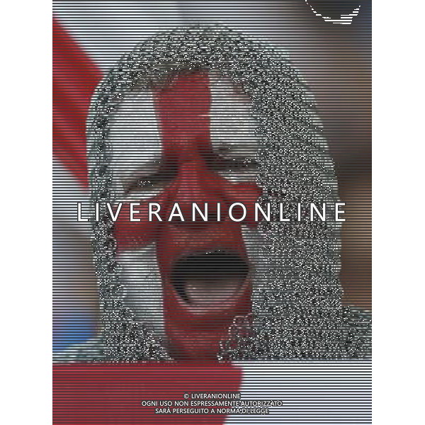 (140614) -- MANAUS, June 14, 2014 () -- An England\'s fan cheers before a Group D match between England and Italy of 2014 FIFA World Cup at the Arena Amazonia Stadium in Manaus, Brazil, June 14, 2014. (/Zhou Lei)(rh) ©PHOTOSHOT/Agenzia Aldo Liverani sas - ITALY ONLY - EDITORIAL USE ONLY - Italia - Inghilterra partita del Gruppo D coppa del mondo 2014 FIFA World Cup Stadio all\'Arena Amazzonia a Manaus, Brasile, 14 giugno 2014