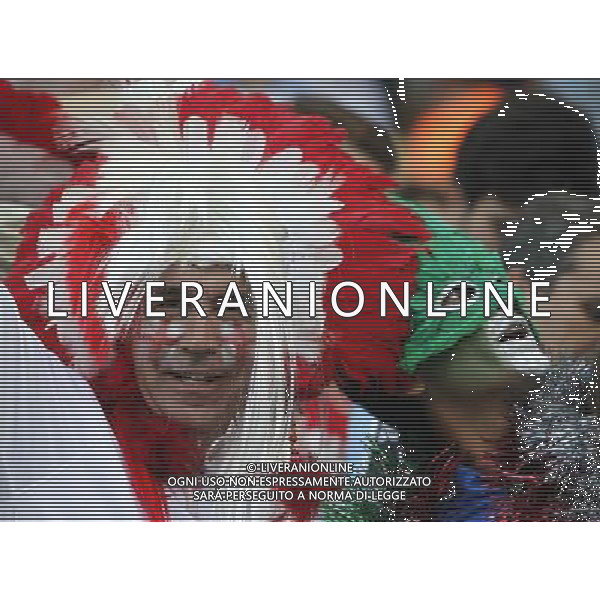 (140614) -- MANAUS, June 14, 2014 () -- An England\'s fan poses before a Group D match between England and Italy of 2014 FIFA World Cup at the Arena Amazonia Stadium in Manaus, Brazil, June 14, 2014. (/Zhou Lei)(rh) ©PHOTOSHOT/Agenzia Aldo Liverani sas - ITALY ONLY - EDITORIAL USE ONLY - Italia - Inghilterra partita del Gruppo D coppa del mondo 2014 FIFA World Cup Stadio all\'Arena Amazzonia a Manaus, Brasile, 14 giugno 2014