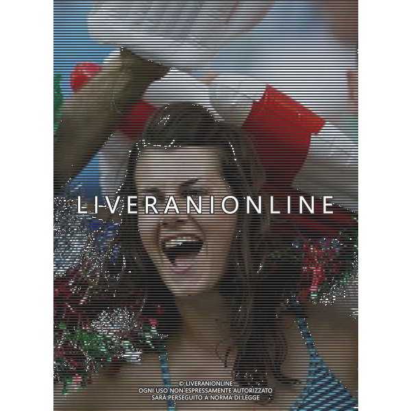 (140614) -- MANAUS, June 14, 2014 () -- An England\'s fan cheers before a Group D match between England and Italy of 2014 FIFA World Cup at the Arena Amazonia Stadium in Manaus, Brazil, June 14, 2014. (/Zhou Lei)(rh) ©PHOTOSHOT/Agenzia Aldo Liverani sas - ITALY ONLY - EDITORIAL USE ONLY - Italia - Inghilterra partita del Gruppo D coppa del mondo 2014 FIFA World Cup Stadio all\'Arena Amazzonia a Manaus, Brasile, 14 giugno 2014