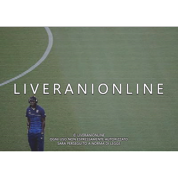 (140614) -- MANAUS, June 14, 2014 () -- Italy\'s Mario Balotelli is seen on the field before a Group D match between England and Italy of 2014 FIFA World Cup at the Arena Amazonia Stadium in Manaus, Brazil, June 14, 2014. (/Liao Yujie)(pcy) ©PHOTOSHOT/Agenzia Aldo Liverani sas - ITALY ONLY - EDITORIAL USE ONLY - Italia - Inghilterra partita del Gruppo D coppa del mondo 2014 FIFA World Cup Stadio all\'Arena Amazzonia a Manaus, Brasile, 14 giugno 2014