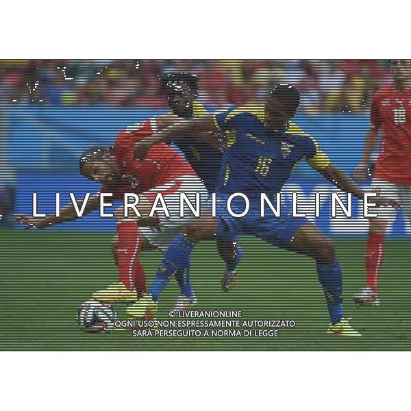 (140615) -- BRASILIA, June 15, 2014 () -- Ecuador\'s Antonio Valencia (R) vies with Switzerland\'s Ricardo Rodriguez during a Group E match between Switzerland and Ecuador of 2014 FIFA World Cup at the Estadio Nacional Stadium in Brasilia, capital of Brazil, June 15, 2014. Switzerland won 2-1 over Ecuador on Sunday.(/Liu Dawei)(pcy) ©PHOTOSHOT/Agenzia Aldo Liverani sas - ITALY ONLY - EDITORIAL USE ONLY - SVIZZERA VS ECUADOR partita del Gruppo E Coppa del mondo Fifa allo Stadio nazionale di Brasilia, Brasile, 15 giugno 2014. Svizzera ha vinto per 2-1