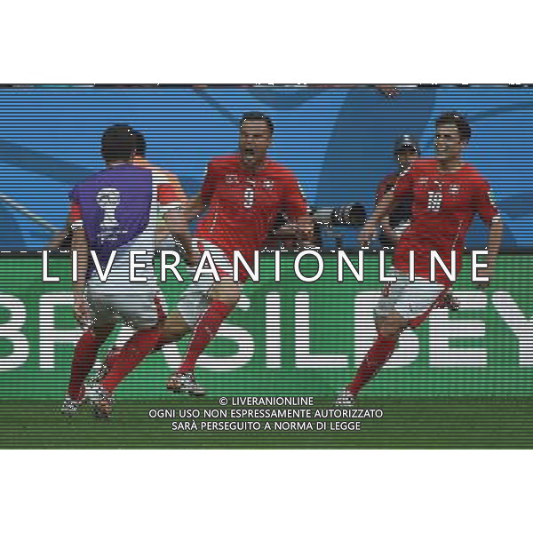(140615) -- BRASILIA, June 15, 2014 () -- Switzerland\'s Haris Seferovic (2nd R) celebrates for his goal with his teammates during a Group E match between Switzerland and Ecuador of 2014 FIFA World Cup at the Estadio Nacional Stadium in Brasilia, capital of Brazil, June 15, 2014. Switzerland won 2-1 over Ecuador on Sunday.(/Liu Dawei)(pcy) ©PHOTOSHOT/Agenzia Aldo Liverani sas - ITALY ONLY - EDITORIAL USE ONLY - SVIZZERA VS ECUADOR partita del Gruppo E Coppa del mondo Fifa allo Stadio nazionale di Brasilia, Brasile, 15 giugno 2014. Svizzera ha vinto per 2-1