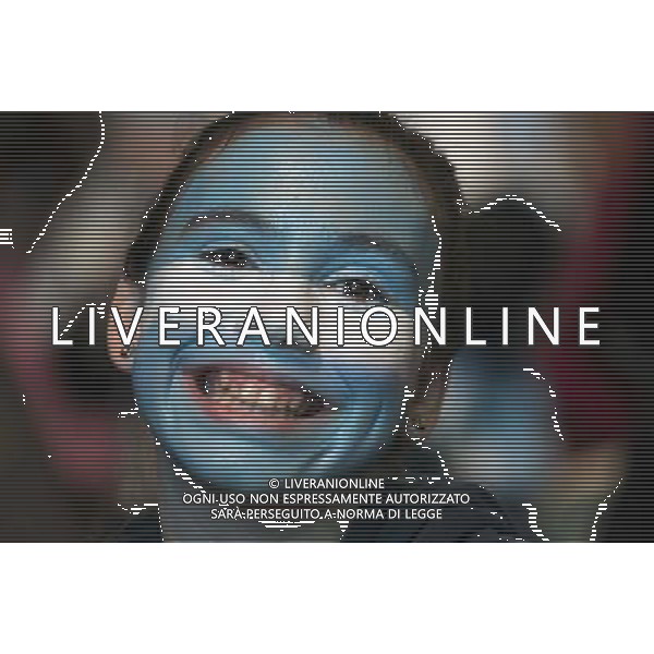 (140615) -- BUENOS AIRES, June 15, 2014 () -- An Argentina\'s fan poses while watching a Group F match of 2014 Brazil FIFA World Cup between Argentina and Bosnia and Herzegovina, in Buenos Aires, capital of Argentina, on June 15, 2014. Argentina won 2-1 over Bosnia and Herzegovina on Sunday. (/Martin Zabala) (pcy) ©PHOTOSHOT/Agenzia Aldo Liverani sas - ITALY ONLY - EDITORIAL USE ONLY - Argentina Bosnia-Erzegovina partita del Gruppo F Coppa del mondo FIFA 2014 Stadio Maracana\' Estadio a Rio de Janeiro, in Brasile, 15 giugno 2014.